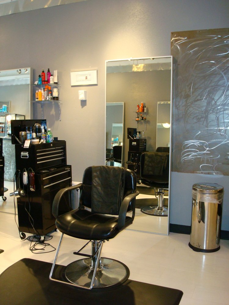 Styling chair and steel tool-chest station inside Hardware Salon, Capitol Hill, Seattle